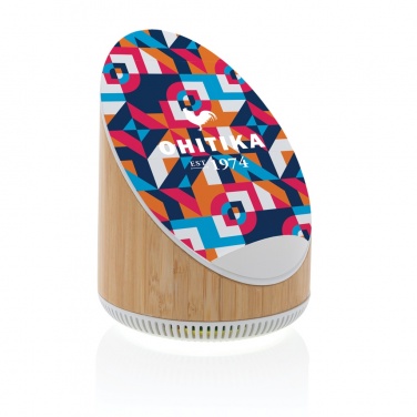 Logotrade advertising products photo of: Ovate bamboo 5W speaker with 15W wireless charger