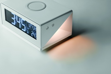 Logotrade biznesa dāvanas foto: LED pulkstenis un bezvadu lādētājs 5W