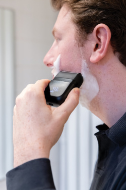 Лого трейд бизнес-подарки фото: Аккумуляторная дорожная бритва TrimBlade, степень защиты IPX7.