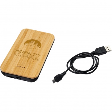 Logotrade profilreklam bild: Framtida bambu/tyg 6 000 mAh trådlös powerbank